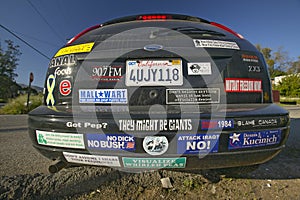 Car with political and social issues stickers