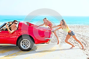Car pushing teen girls humor funny guy driving photo