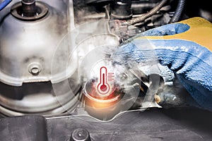 Car radiator overheating and smoke with a high temperature signal symbol