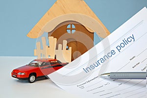 Car and real estate insurance concept