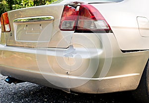 Car rear light with bumper scrash and broken by accident on road,Car insurance concept