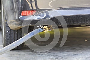 A car refuel the cheap LPG at gas station