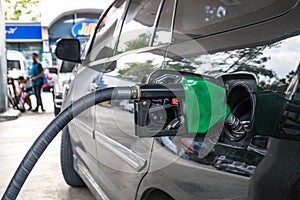 Car refuel at eco-friendly gas station photo