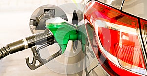 Car refuel at the petrol station. Concept photo for use of fuels gasoline, diesel, ethanol in combustion engines, air pollution photo