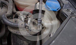 Car repair, fuel filter replacement