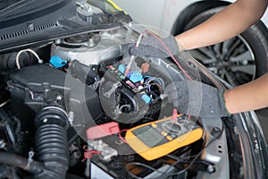 Car repair and maintenance. Performing engine diagnostics