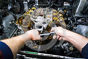 Car repair: overhaul of the V6 engine with detailed pulleys and parts