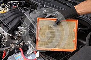 Car repair shop. Replacing the car air filter