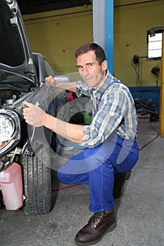 Car repairer at work