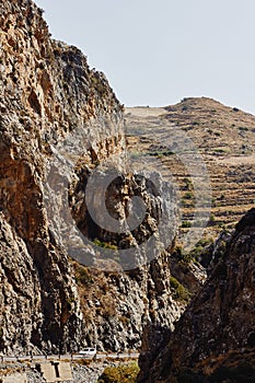 Car rides along the road through the Kourtaliotiko Gorge, Crete, Greece