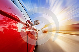 Car on road with motion blur background