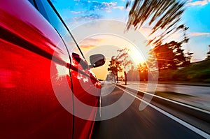 Car on road with motion blur background