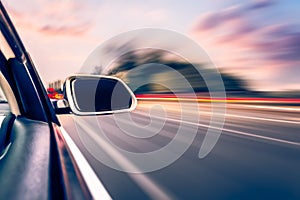 Car on the road with motion blur background