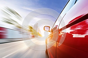 Car on road with motion blur background