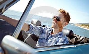 Car road trip, travel and laughing man on holiday adventure, transportation journey or fun summer vacation. Ocean sea