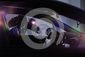 Car Robber with Flashlight