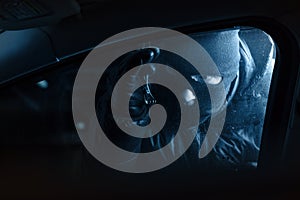 Car robber at night