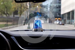 Car with rotating emergency light