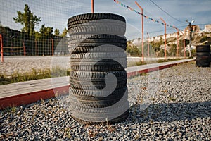 car rubber tires lying on top of each other