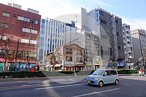 Car running on street in Tokyo, Japan