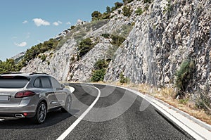 Car rushing along a high-speed highway.