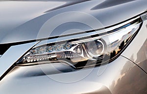 Car`s exterior details. Close up detail LED headlights