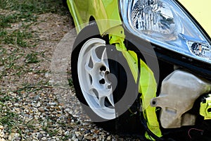 A car`s grille slipped off the hood panel.