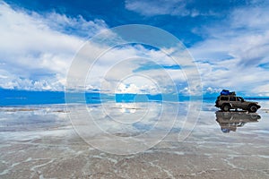 Car on Salar de Uyuni