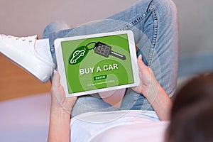 Car sale concept on a tablet