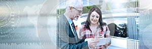 Car salesman giving explanations on tablet to young woman. panoramic banner