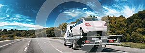 Car Service Transportation Concept. Tow Truck Transporting Car Or Help On Road Transports Wrecker Broken Car. Auto