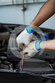Car servicing, replacing of air filter, fixing hose clamp,car maintenance concept