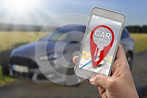 Car sharing app with smartphone photo