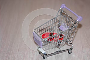 A car in a shopping cart