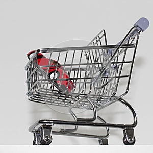 A car in a shopping cart