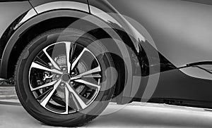 Car showroom. Aluminum wheel with Tire. automobile wheel tire. aluminium rims. Motor Corporation is Japanese automotive