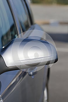 A car side mirror in a close up
