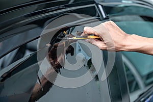 Car side window film removal and tinting installation