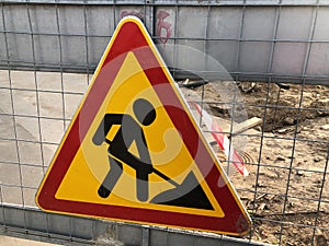 Car sign road works on the street
