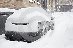 Car in snow. Car parked near home parked into snow.