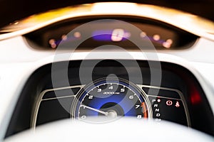 Car speed meter dashboard and cockpit, closeup