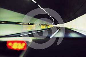 Car speeding in tunnel expressway