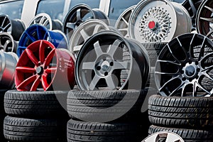 Car sport rims and tyres shown at a tyre shop. photo