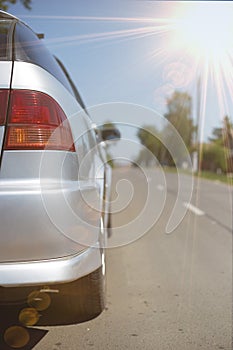 The car is standing on an asphalt road concept in the way, life is a road