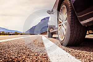 Car is standing on the breakdown lane, asphalt and tyre, Italy