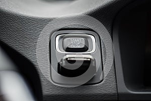 Car start stop button with inserted ignition key