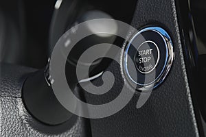 Car stop start button