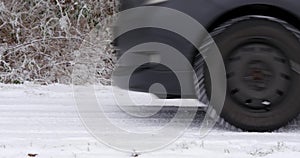 Car stopping on snowy road