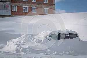 Car stuck in heavy snowbank