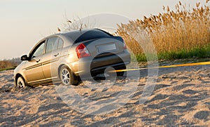 Car stuck in sand